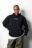 Hadnet Tesfai trägt Merchandise von SOS Humanity